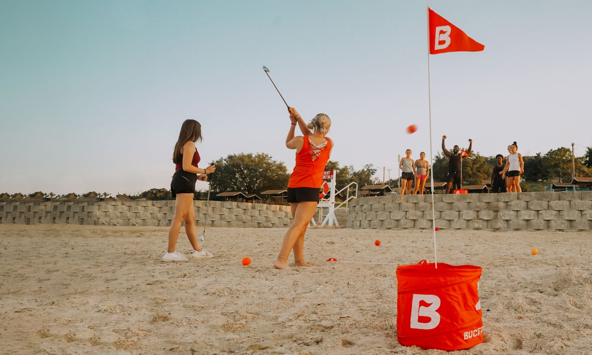 BucketGolf family playing in a backyard